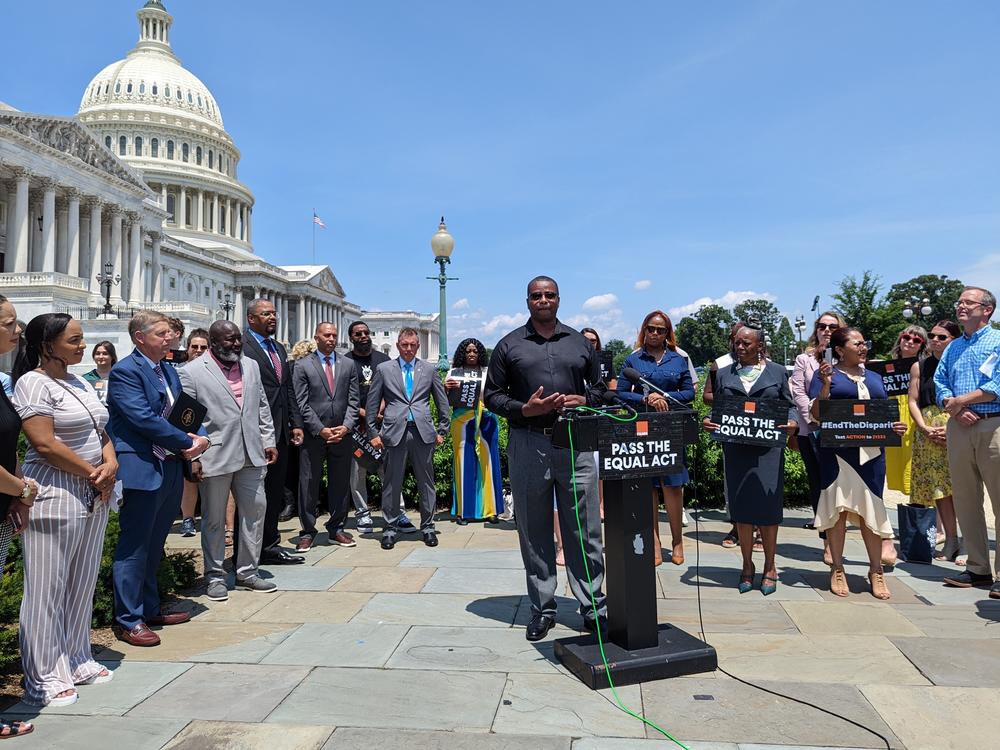 Orrin Jackson, center, is one of the nonprofit Dream.org's network of formerly incarcerated people who lobbied Congress to pass the Eliminating a Quantifiably Unjust Application of the Law<strong> </strong>(EQUAL) Act. Shown here are lawmakers and bill advocates from Dream.org and Families Against Mandatory Minimums (FAMM).
