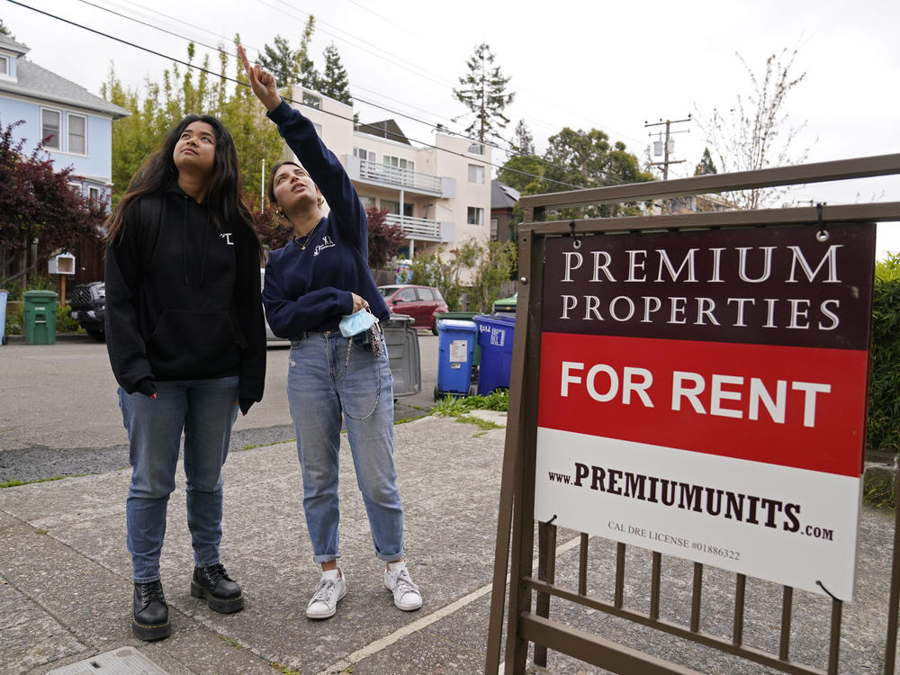 College students look for an apartment in Berkeley, Calif. Rental application fees are a barrier to many in a tight housing market. California is the latest in a string of states and cities passing laws to try and limit them.