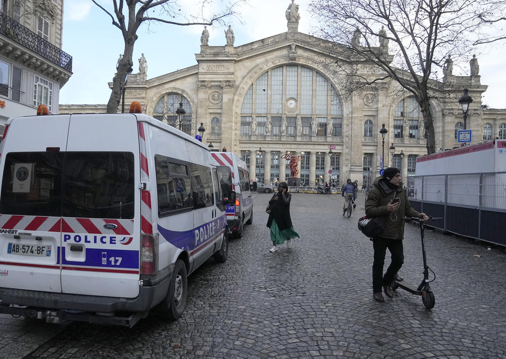 A police car parks outside the Gare du Nord train station on Wednesday.