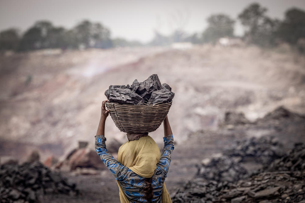 Anjali, 16, in the pits of Ghansadih mine, Jharia, where she collects coal<strong> </strong>in the morning. She and her mother and younger sister earn up to 1,200 rupees (around $14.50) a week by selling the coal they scavenge.