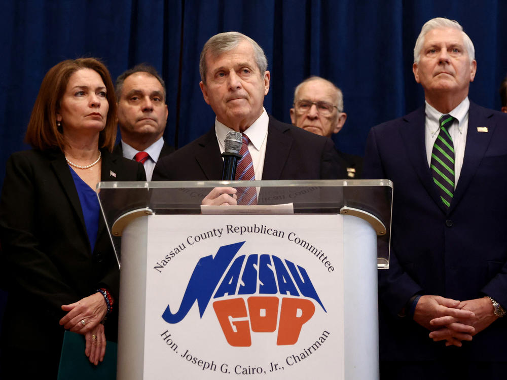 Nassau County Republican Party Chairman Joseph Cairo and members of the Nassau County Republican Committee hold a news conference Jan. 11 in Westbury, N.Y., to call for the resignation of U.S. Rep. George Santos.