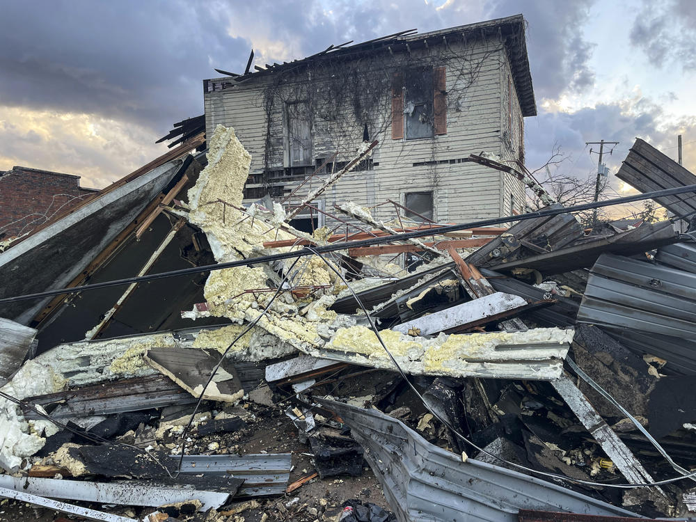 A damaged structure and debris are seen in the aftermath of Thursday's severe weather in Selma, Ala.