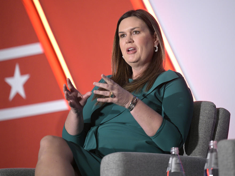 Arkansas Gov. Sarah Huckabee Sanders answers a question while taking part in a panel discussion during a Republican Governors Association conference, Wednesday, Nov. 16, 2022, in Orlando, Fla.