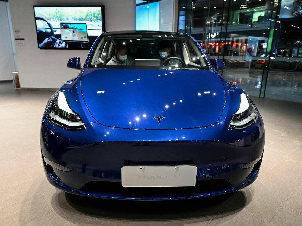 Tesla's Model Y is on display at a Tesla showroom in a shopping mall in Beijing on April 29, 2022. The electric car maker cut prices for its models in a bid to boost sales.