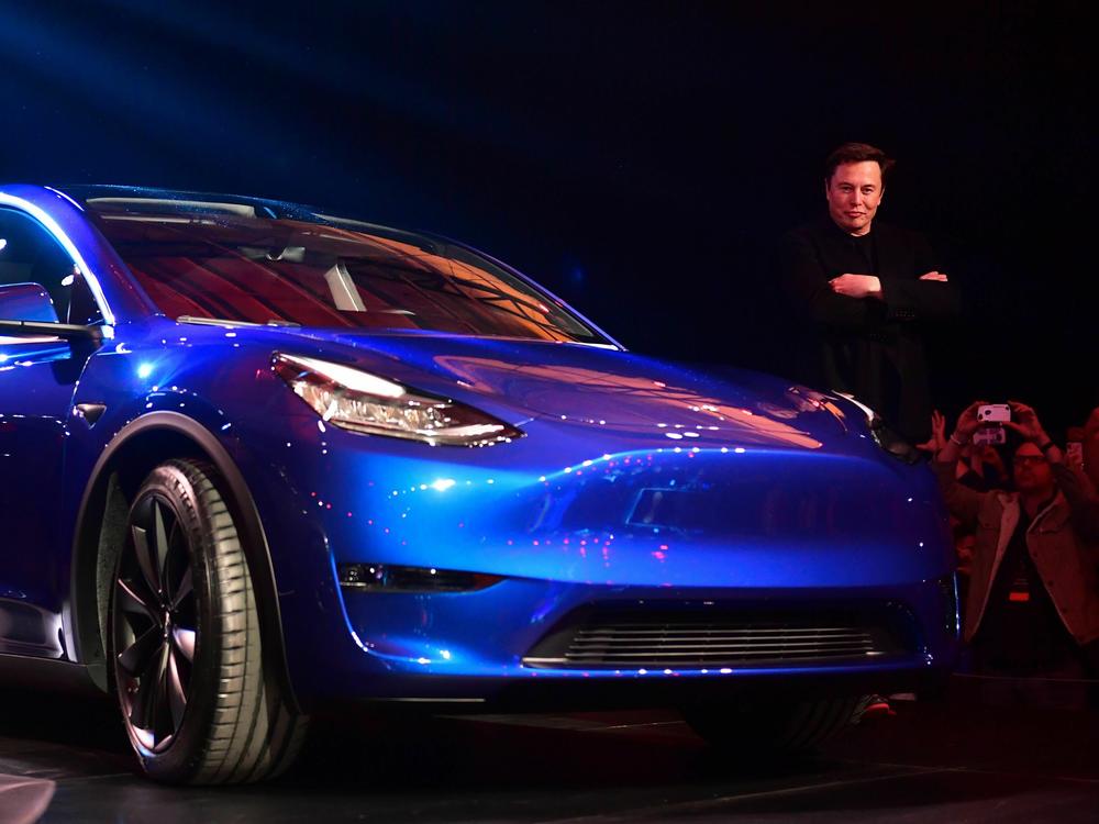 Tesla shareholders say CEO Elon Musk, pictured here unveiling the Model Y in Hawthorne, Calif., in 2019, brought undue financial risk to the company by tweeting about a possible buyout.