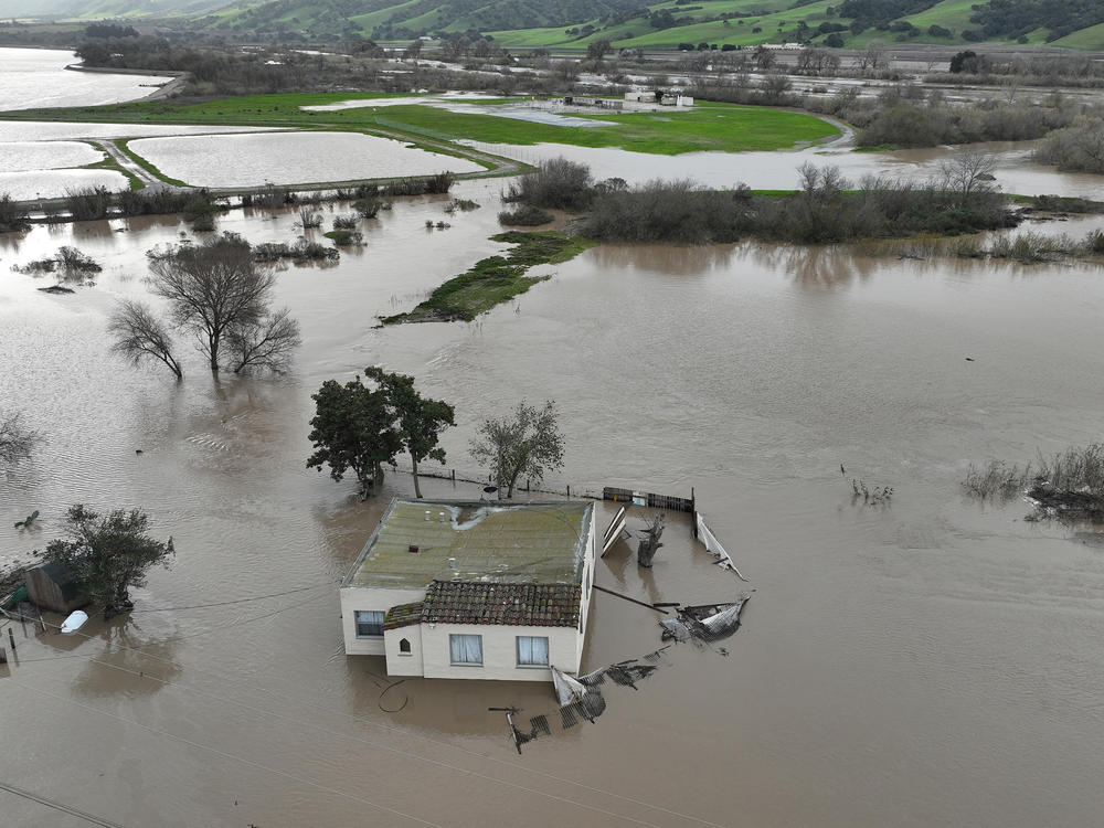 A home is submerged in floodwater, after the Salinas River overflowed its banks on Friday.