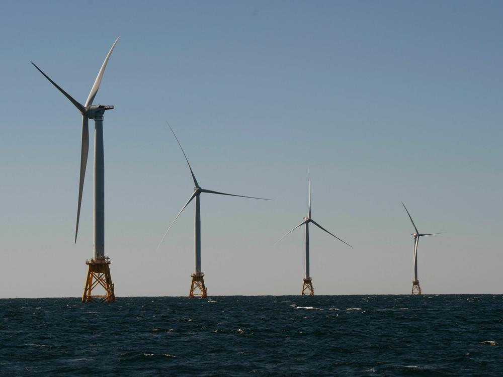 Wind turbines, of the Block Island Wind Farm, tower over the water on October 14, 2016 off the shores of Block Island, Rhode Island.