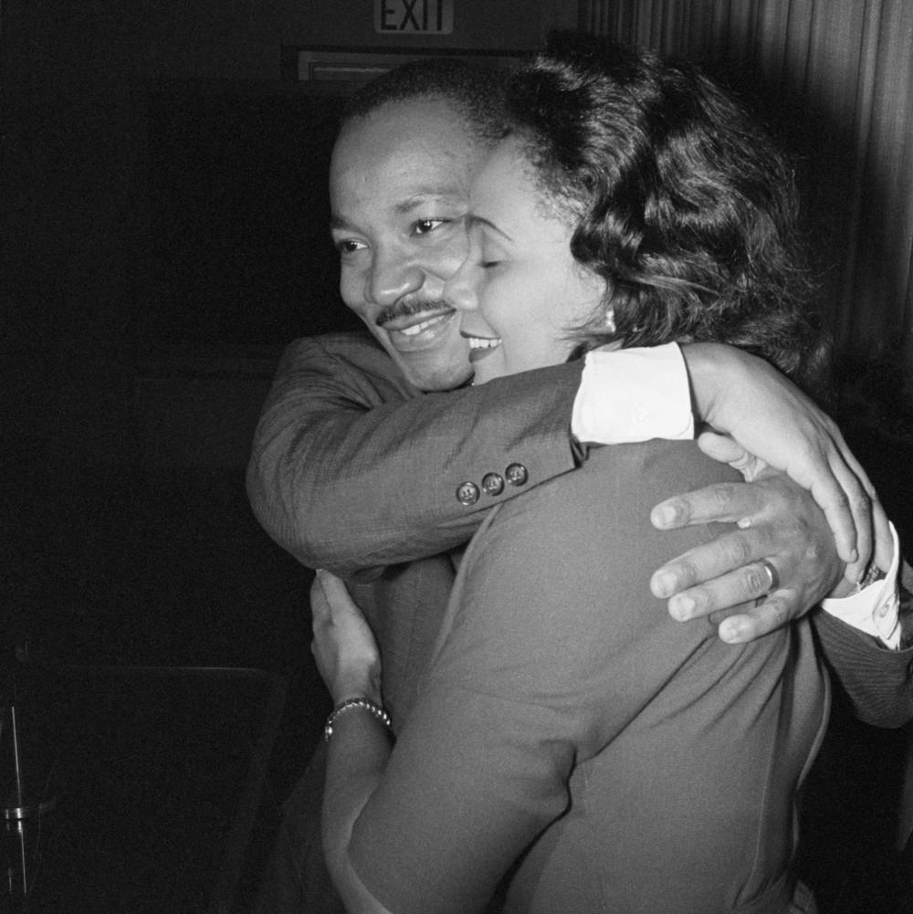 Martin Luther King Jr. hugs his wife Coretta Scott King after the announcement that he had been awarded the Nobel Peace Prize.