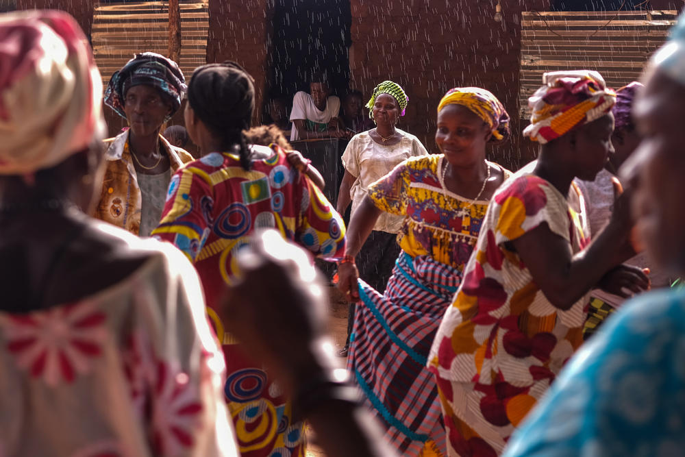 Women dance at a funeral celebration in Cobiana, Guinea-Bissau, on Sept. 11, 2019.