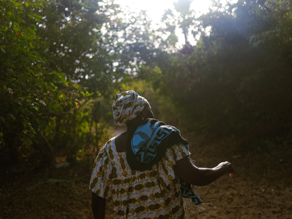 Diakine Sambou, queen of the sacred forest of Kaoupoto, on Feb. 23, 2021, in Mlomp, Senegal.