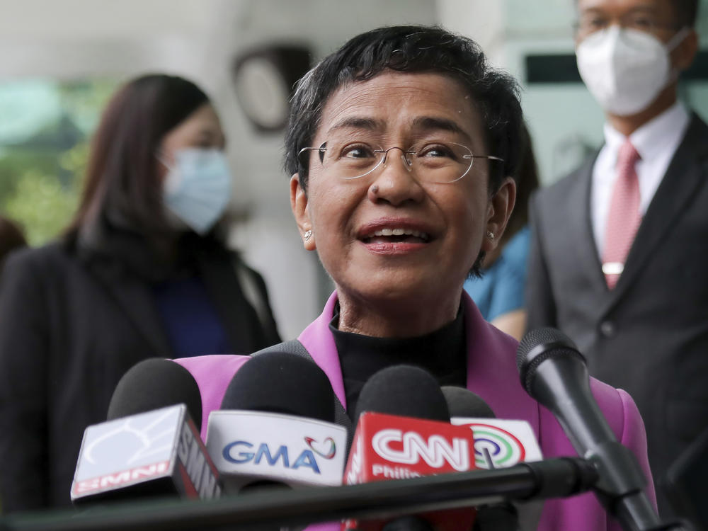Filipino journalist Maria Ressa, one of the winners of the 2021 Nobel Peace Prize and Rappler CEO, speaks to the media after a court decision at the Court of Tax Appeals in Quezon City, Philippines. The court on Wednesday cleared Ressa and her online news company of tax evasion charges.
