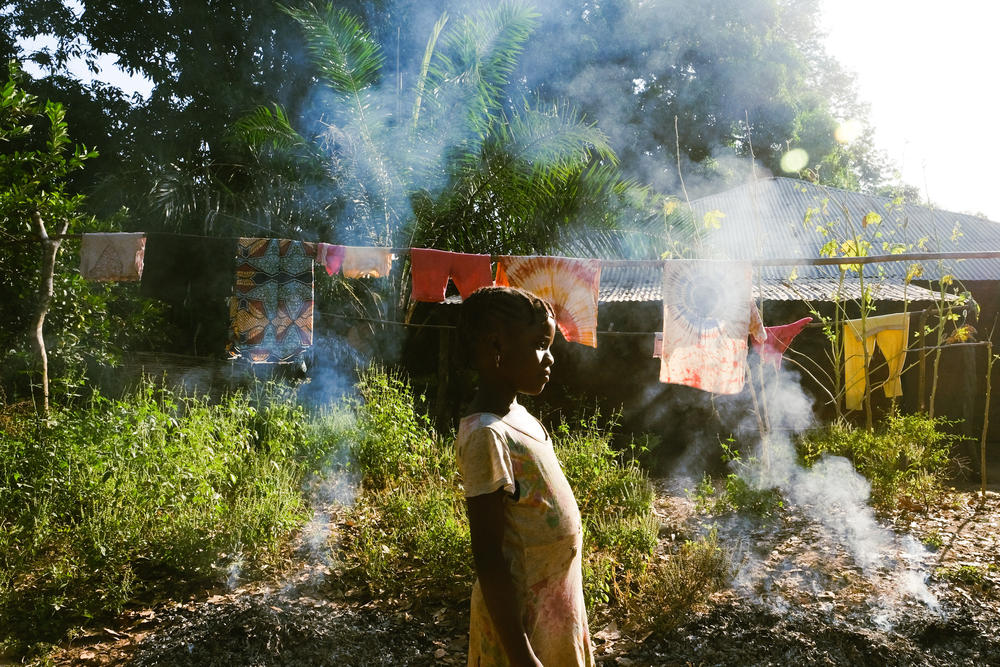 A young girl in Cobiana, near the sacred forest of Cobiana, in northern Guinea-Bissau, on Dec. 11, 2020.