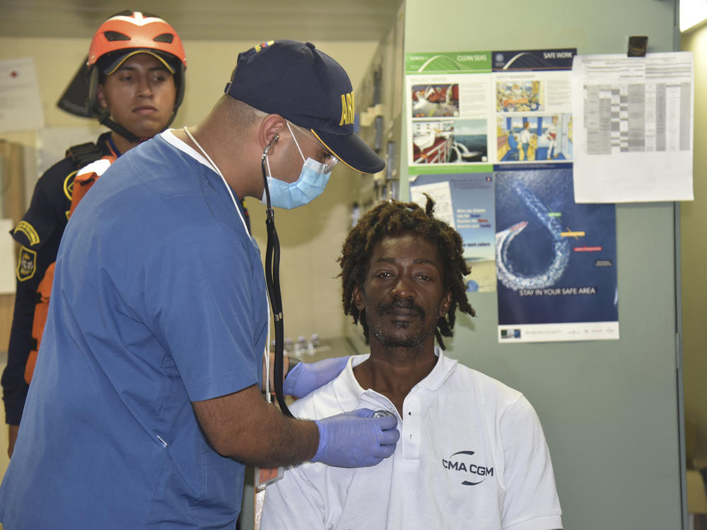 Castaway Elvis Francois is attended by Colombian Navy members after he was rescued near the department of La Guajira, in the extreme north of Colombia. According to the Navy, the 47-year-old from Dominica said he had been adrift for 24 days in the Caribbean Sea after he was repairing a boat last December near the island of Sint-Maarten in the Netherlands Antilles.