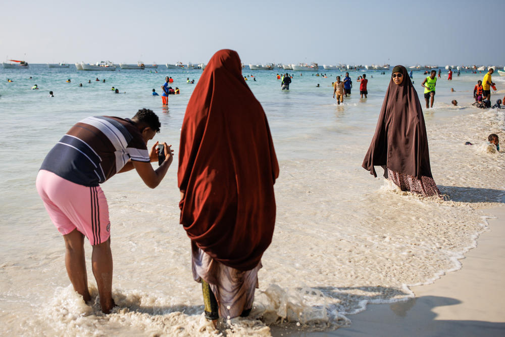 Families gather on Liido Beach in Mogadishu particularly on Fridays to relax.  One resident says Liido Beach is one of the only public places in the city that's open to everyone and relatively safe.