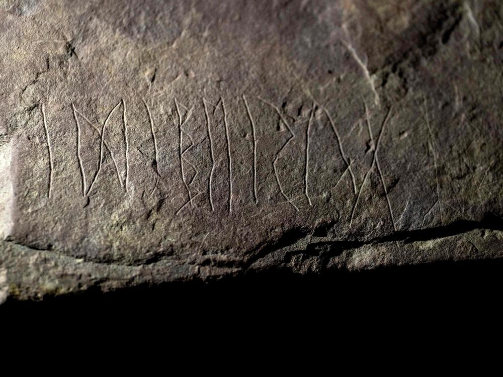 Detailed view shows inscriptions on a sandstone rock, believed to be the world's oldest runestone inscribed almost 2,000 years ago, making it several hundred centuries older than the earliest known ones.