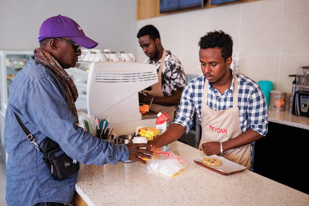 A barista at Beydan Coffee, part of a chain of fancy coffee shops in Mogadishu set up by a couple who'd emigrated to Canada years ago and then returned to Somalia.