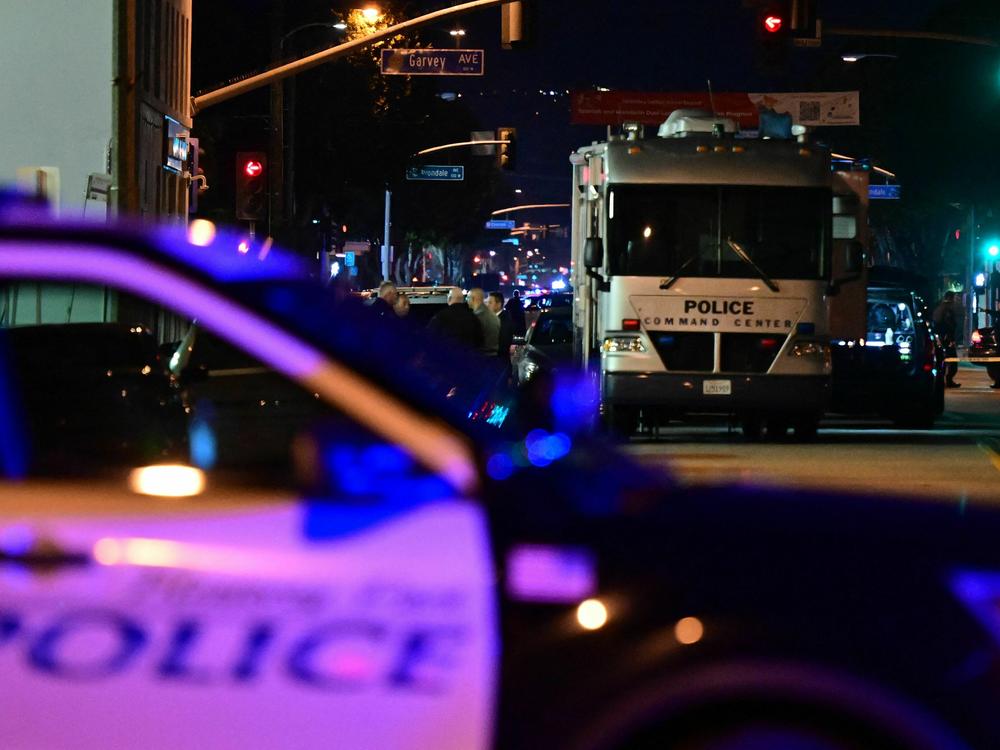 Police gather at the scene of a mass shooting in Monterey Park, Calif., over the weekend.