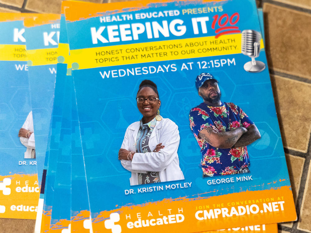 Dr. Kristin Motley, a pharmacist, founded Health Educated, an outreach organization in Delaware County, Pa. Flyers for the podcast she hosts with George Mink Jr. (Kimberly Paynter/WHYY)