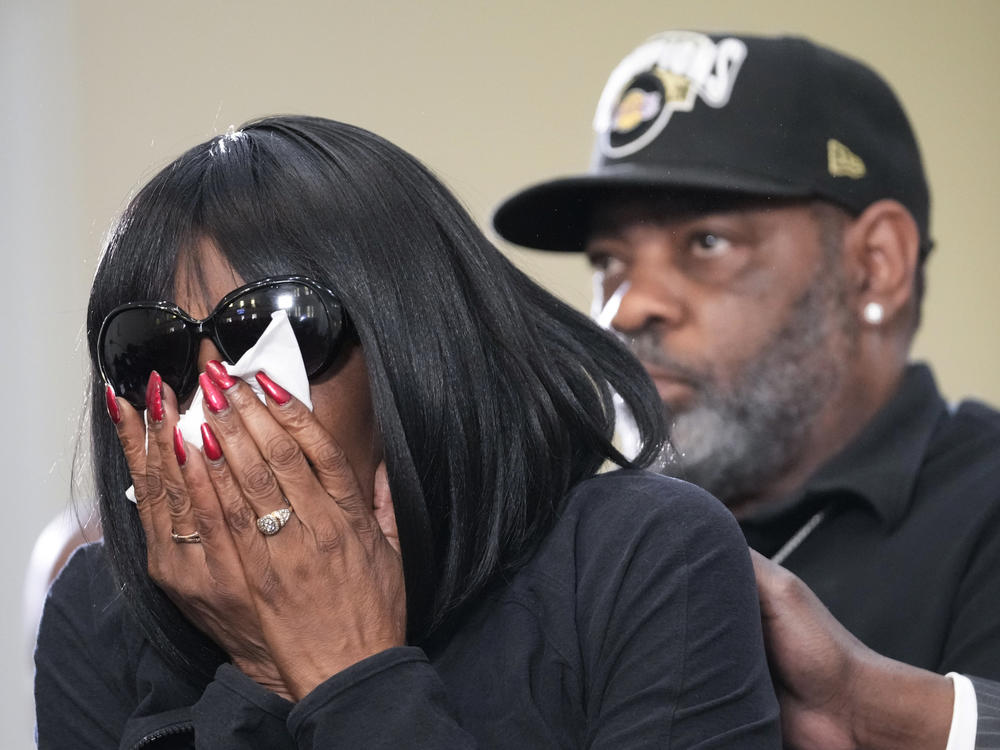 RowVaugn Wells, the mother of Tyre Nichols, who died after being beaten by Memphis police officers, cries as she is comforted by Tyre's stepfather Rodney Wells, during a news conference on Monday, Jan. 23, 2023.