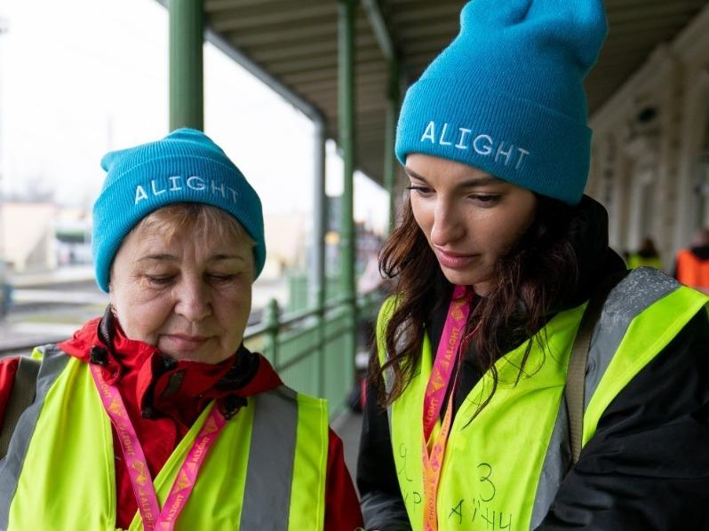 Alight Guides meeting refugees at Przemysl, Poland train station. Alight Guides work in the US and around the world to support both refugees as well as US sponsor groups through the entire journey.