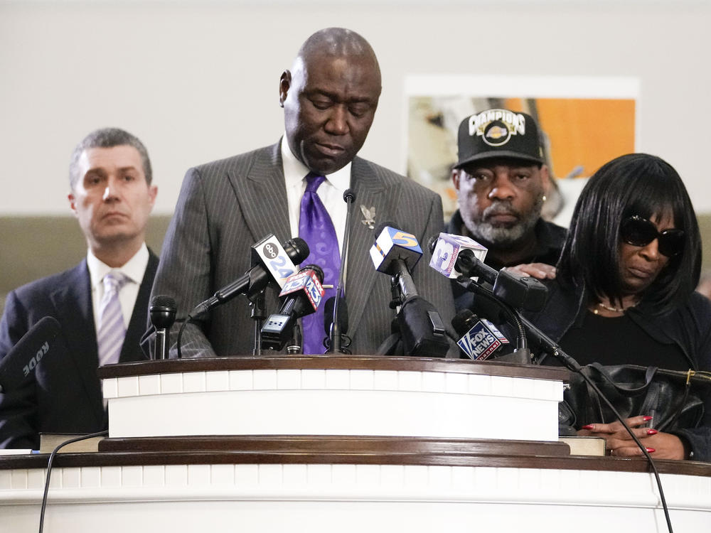 Civil rights attorney Ben Crump speaks at a news conference with the family of Tyre Nichols, who died after being beaten by Memphis police officers, as RowVaughn Wells, mother of Tyre, right, and Tyre's stepfather Rodney Wells, along with attorney Tony Romanucci, left, also stand with Crump, in Memphis, Tenn., Monday, Jan. 23, 2023.