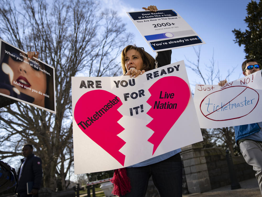 Penny Harrison and her son Parker Harrison rally outside the U.S. Capitol during the Senate Judiciary Committee's Ticketmaster hearing on Tuesday morning.