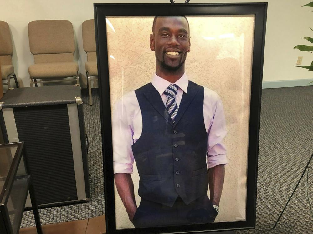 A portrait of Tyre Nichols is displayed at a memorial service for him on Jan. 17 in Memphis, Tenn. Nichols died three days after Memphis police officers beat him during a traffic stop on Jan. 7.