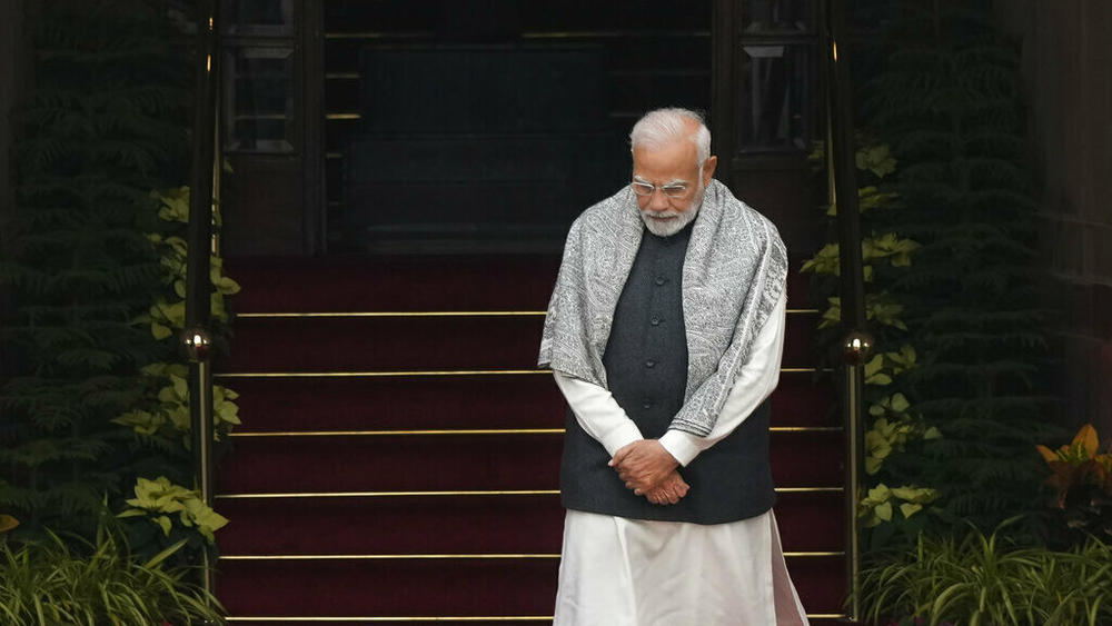Indian Prime Minister Narendra Modi waits Wednesday for the arrival of Egyptian President Abdel Fattah El-Sisi at Hyderabad house, in New Delhi, India.