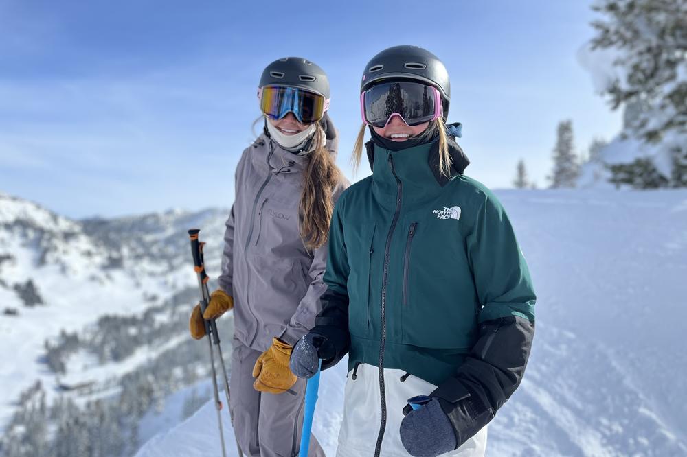 Ali Scheifley (left) and Kate Rath (right), visiting Alta from Colorado, stand on the resort's famous High Traverse.