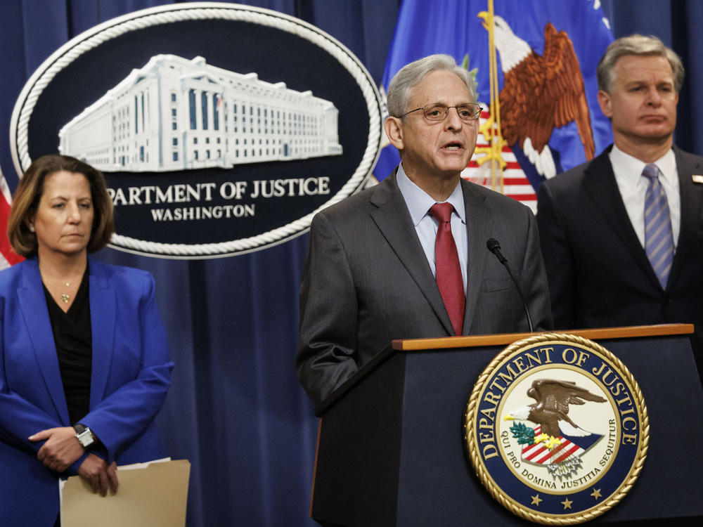 U.S. Attorney General Merrick Garland speaks during a news conference with Deputy Attorney General Lisa Monaco (left), and FBI Director Christopher Wray at the Department of Justice in Washington on Thursday.