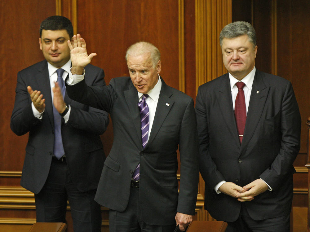Then-Vice President Joe Biden (center), Ukrainian President Petro Poroshenko (right) and parliament speaker Volodymyr Groysman in Ukrainian parliament, in Kyiv, Ukraine, Dec. 8, 2015.