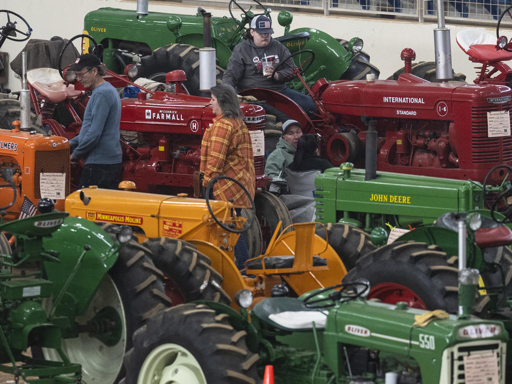 People view antique tractors at the annual Pennsylvania Farm Show in Harrisburg, Pa., on Jan. 11.