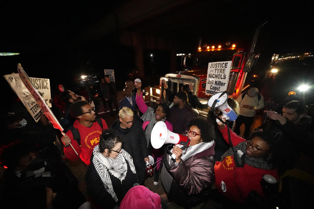 Protesters take over a bridge Friday, Jan. 27, 2023, in Memphis, Tenn., as authorities release police video depicting five Memphis officers beating Tyre Nichols, whose death resulted in murder charges and provoked outrage at the country's latest instance of police brutality.