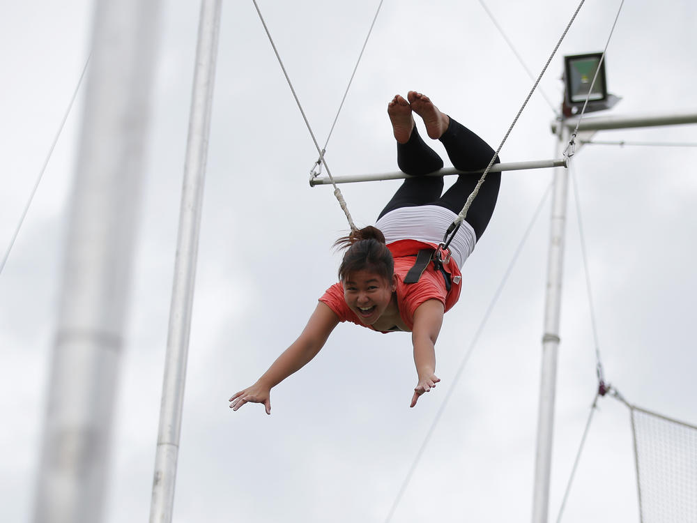 When NPR asked readers to share their hobbies and passions, half a dozen people wrote about the thrill of taking flying trapeze classes.