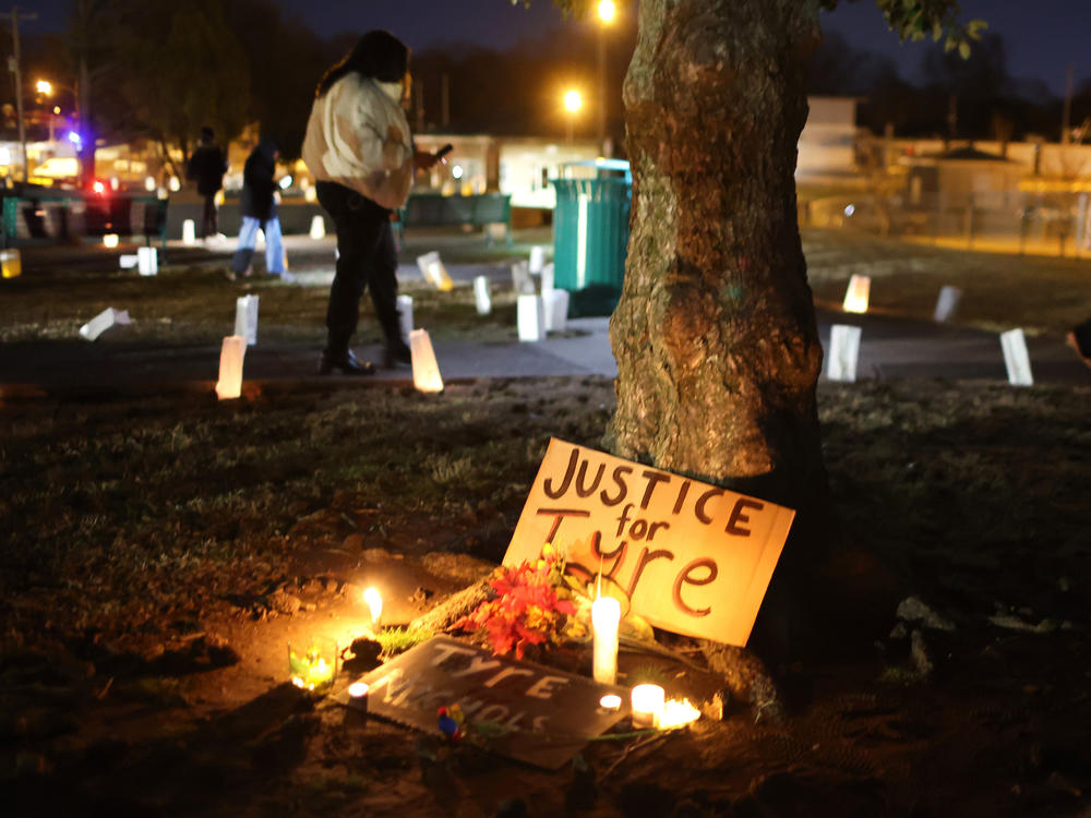 People attend a candlelight vigil in memory of Tyre Nichols on Thursday at the Tobey Skate Park in Memphis, Tenn.