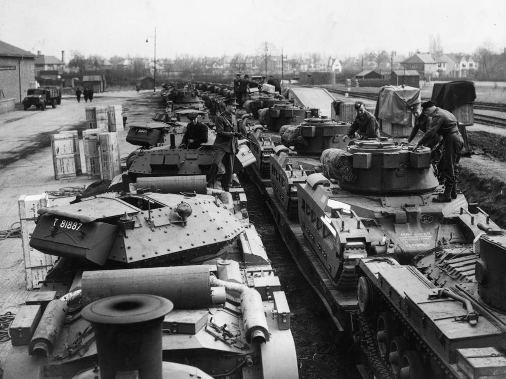 April 1942: British Valentine and Matilda tanks being loaded onto a train bound for Russia.