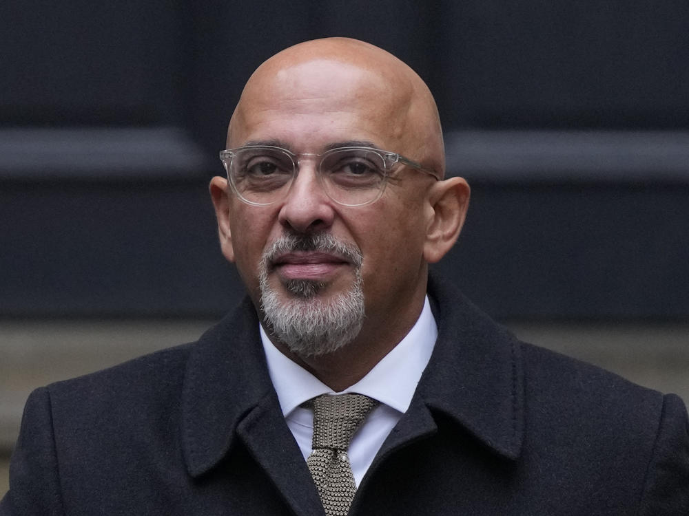 FILE - Conservative Party chairman Nadhim Zahawi leaves the Conservative Party head office in Westminster, central London, Tuesday, Jan. 24, 2023.