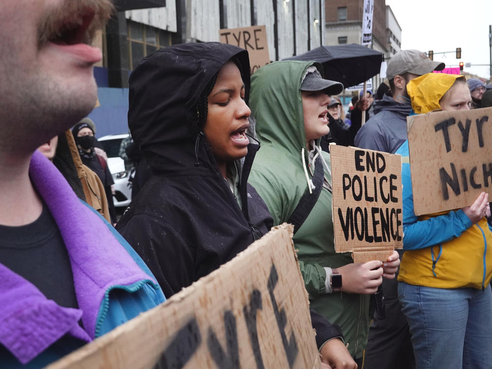 Protesters march through downtown Memphis in response to the death of Tyre Nichols earlier this month. Video footage of Nichols being arrested and beaten by police was released to the public on Friday.