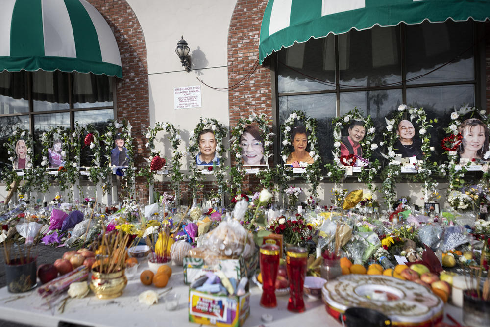 A large memorial is seen outside the Star Dance Studio in Monterey Park, Calif., about a week after a mass shooting at the ballroom studio killed 11 people and wounded 10 others.