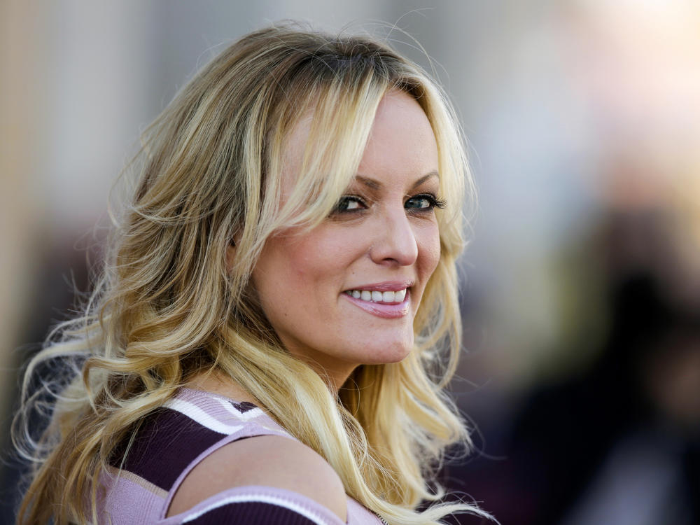 The Manhattan District Attorney's Office is investigating whether former President Donald Trump broke the law with payments allegedly made to cover up an extramarital affair with adult film actress Stormy Daniels, pictured in 2018.