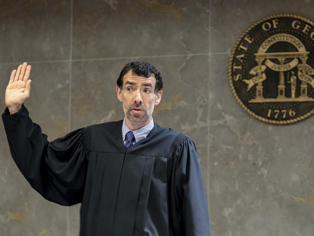 Fulton County Superior Court Judge Robert McBurney swears in potential jurors on May 2, 2022, as he seats a special grand jury to look into the actions of former President Donald Trump and his allies who tried to overturn the 2020 election.