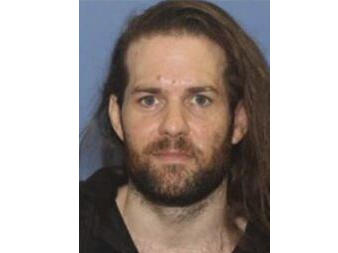 An undated photo provided by the Grants Pass Police Department shows Benjamin Obadiah Foster, who is wanted by authorities for attempted murder, kidnapping and assault.