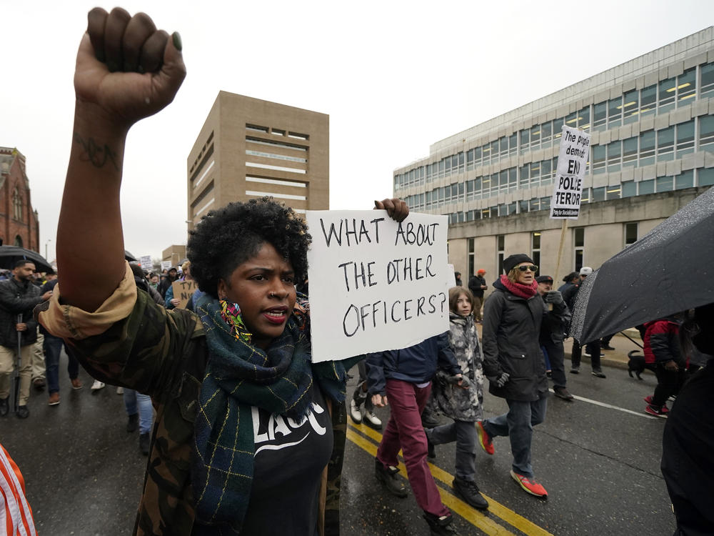 Protesters march on Saturday in Memphis, Tenn., over the death of Tyre Nichols, who died after being beaten by Memphis police.