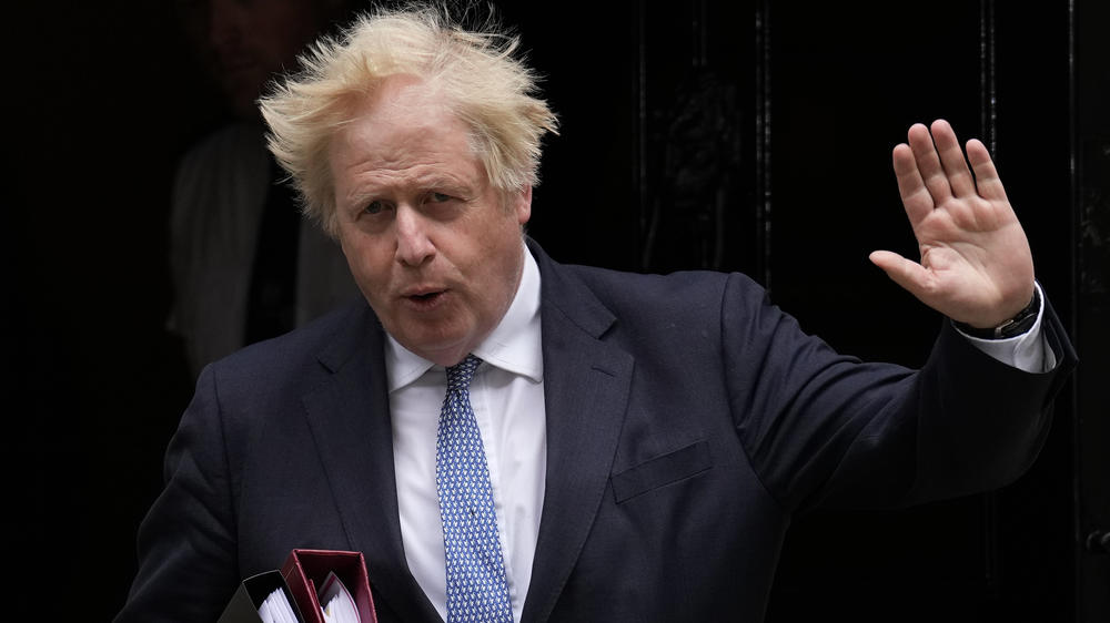 Former Prime Minister Boris Johnson (shown here in May 2022) has said that President Vladimir Putin didn't seem serious about avoiding war in the days before Russia invaded Ukraine. In a new documentary released Monday, he says that at one point Putin told the British leader it would be easy to kill him with a missile.