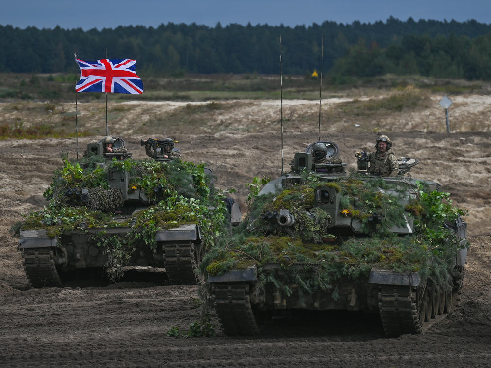 British Army Challenger 2 tanks are seen at a training ground in Poland on Sept. 21, 2022. This week, Ukrainian soldiers have arrived in the United Kingdom for training on the Challenger 2.