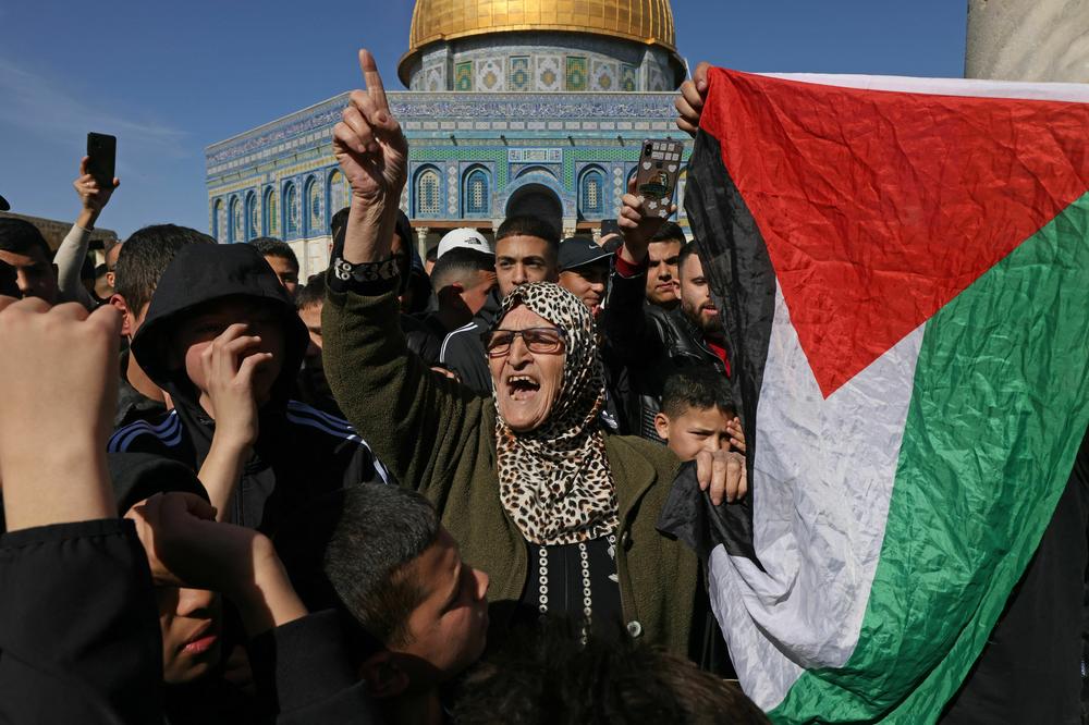 Palestinians protest in the Al-Aqsa mosques compound in Jerusalem on January 27 after one of the deadliest Israeli army raids in the occupied West Bank in years.