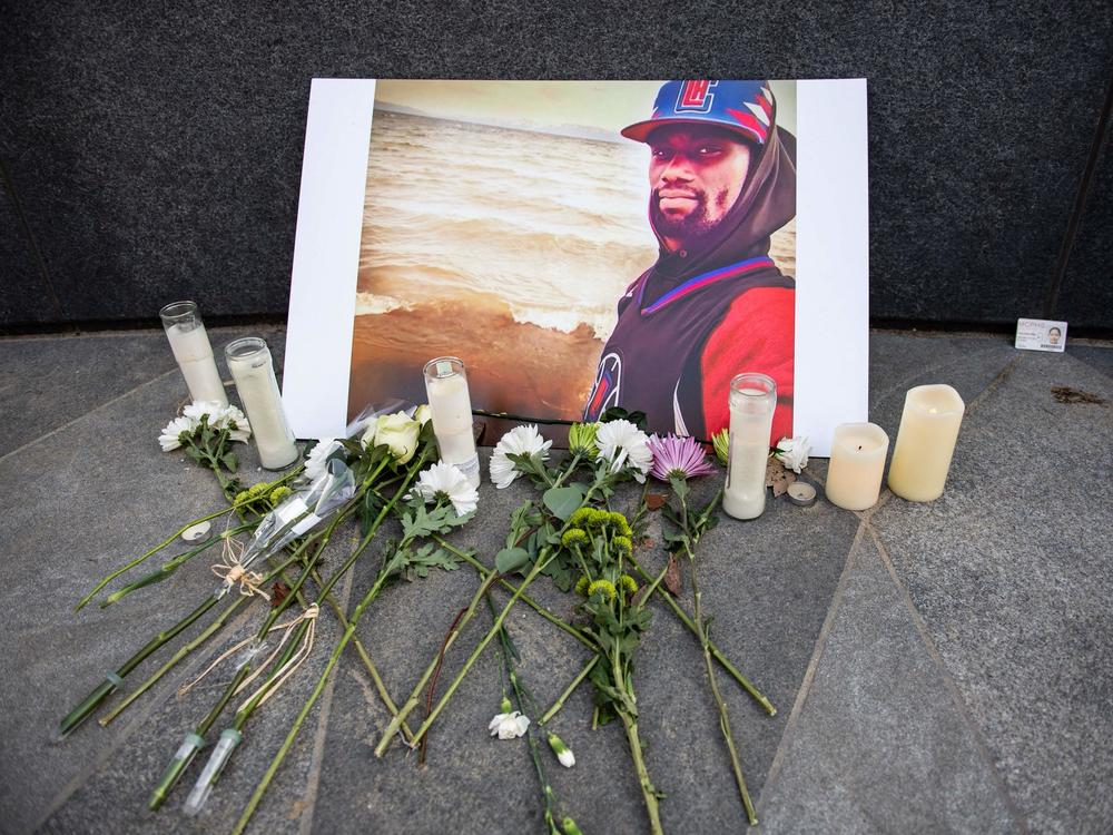 A memorial is displayed for Tyre Nichols at the Embrace statue in Boston, Massachusetts, on January 28, 2023.