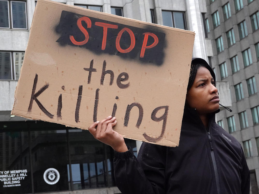 Demonstrators protesting the death of Tyre Nichols gather and march through downtown Memphis, Tenn., on Jan. 28.
