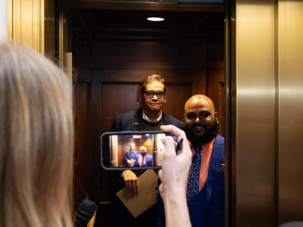 Rep. George Santos, R-N.Y., leaves a House GOP conference meeting in Washington, D.C., on Jan. 25, 2023.