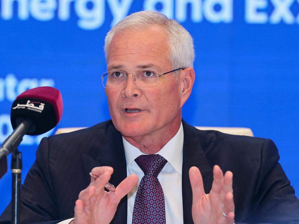 ExxonMobil CEO Darren Woods speaks during a press conference in Doha, Qatar, on June 21, 2022. Exxon is facing political heat from the White House, which wants Big Oil to use their profits to increase production further.